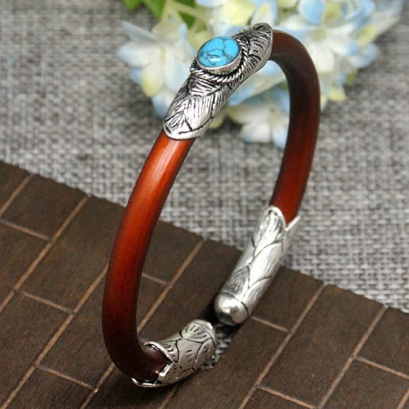 Autentico braccialetto Shannan Yujie Jixueteng in argento tibetano e turchese, un accessorio portafortuna con fascino etnico.