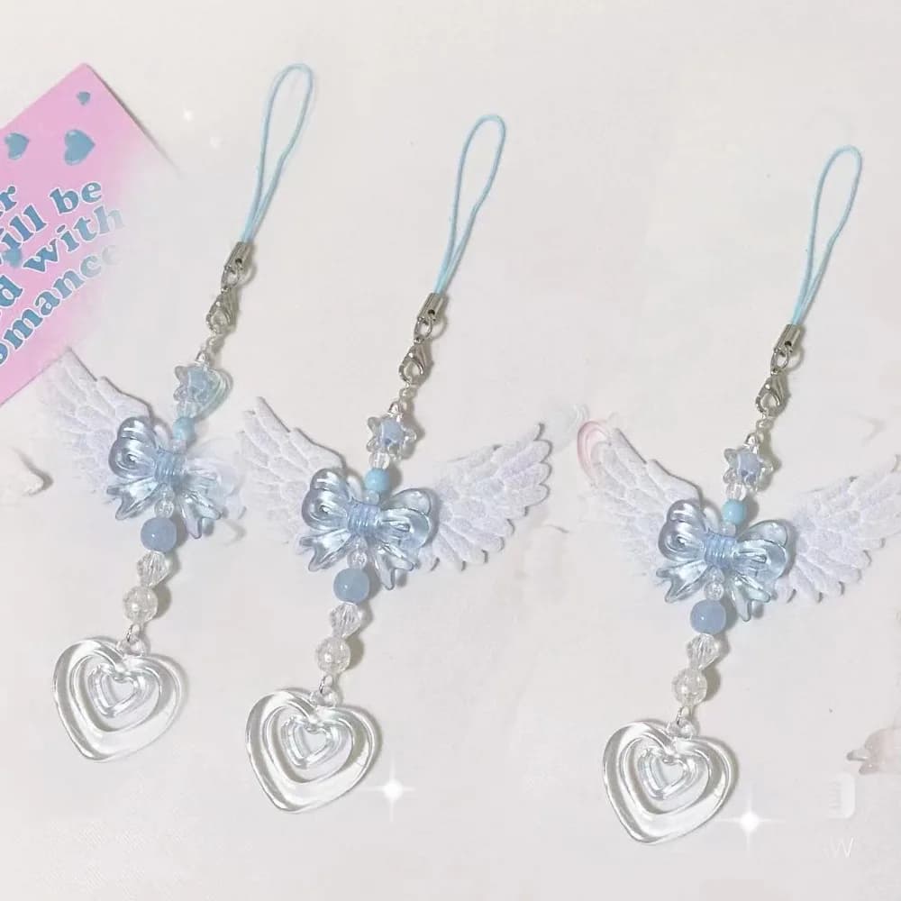 Catenella per cellulare con ciondolo a forma di cuore e ali, accessorio Y2K alla moda per ragazze e donne, ideale come portachiavi o charm per borse, regalo perfetto.