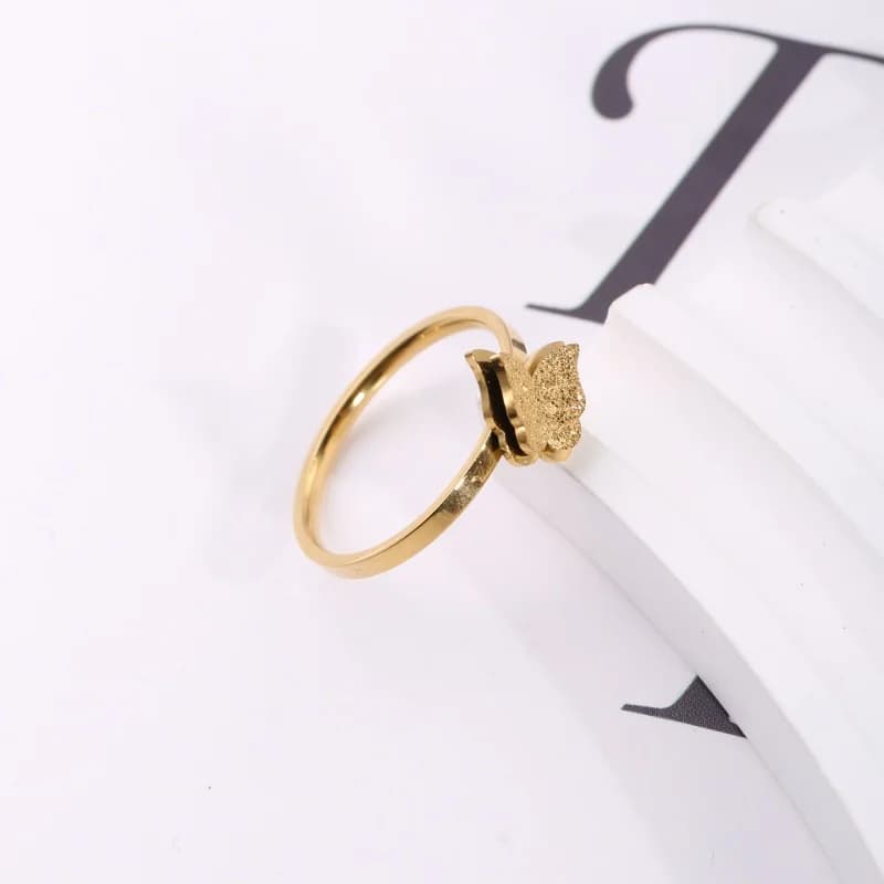 1 piece of stainless steel plated with 18K gold, tilted-head double-layer butterfly frosted ring. Butterfly-shaped, three-dimensional textured ring. Suitable for a gentle, girlish style, paired with delicate dresses and knitwear. It symbolizes freedom and transformation, suitable for daily wear, outings, dates, and commuting