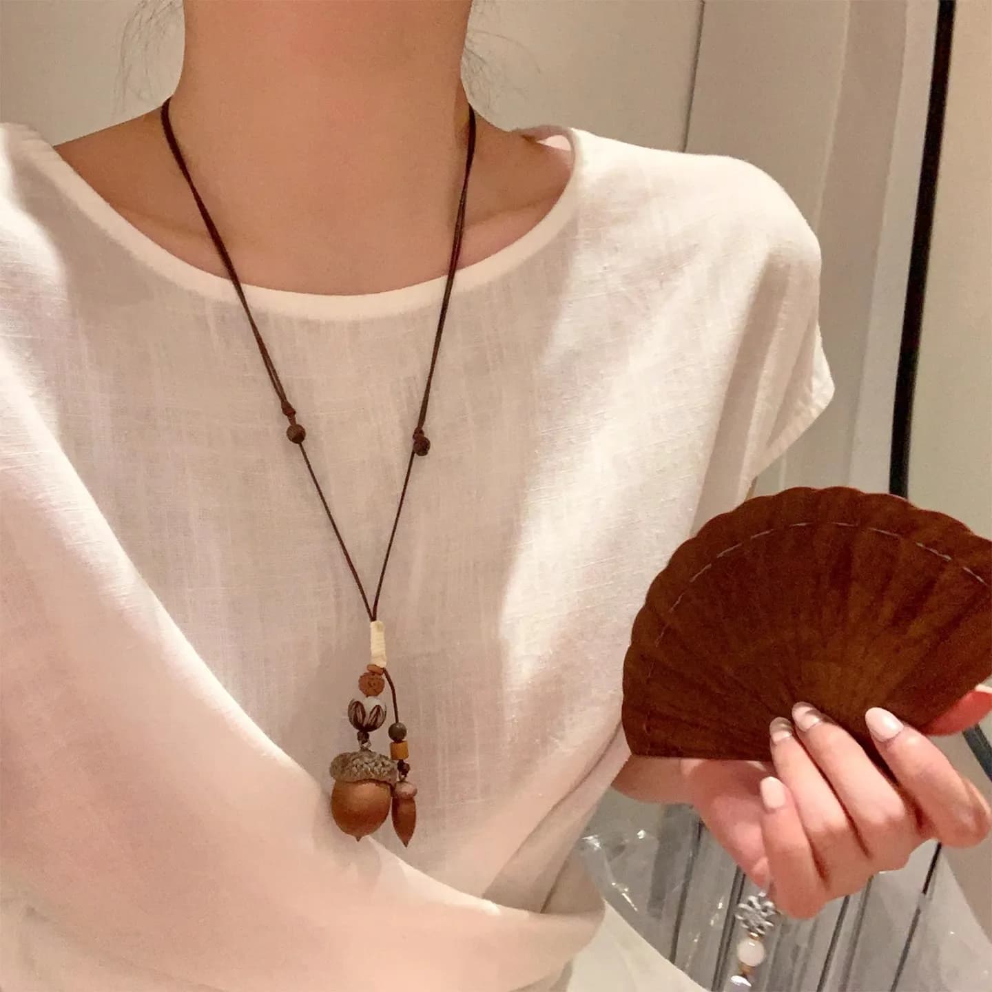 New long necklace with Chinese style acorn pendant for woman, chain neck accessory with Zen vintage design
