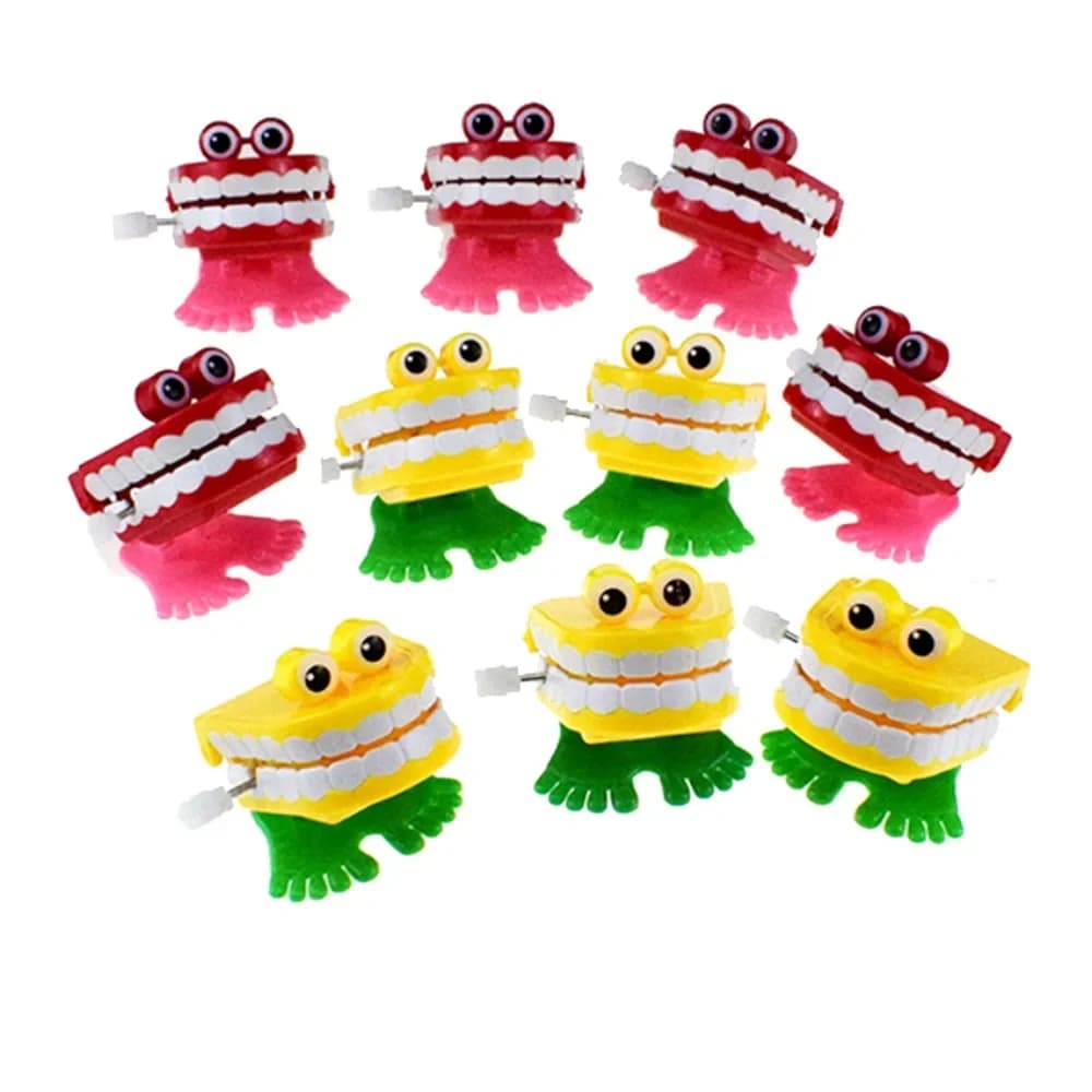 1pc a forma di denti giocattolo a orologeria con catena novità String Up Jumping Walking Mouth Toys bambini piccoli regali di natale di Halloween
