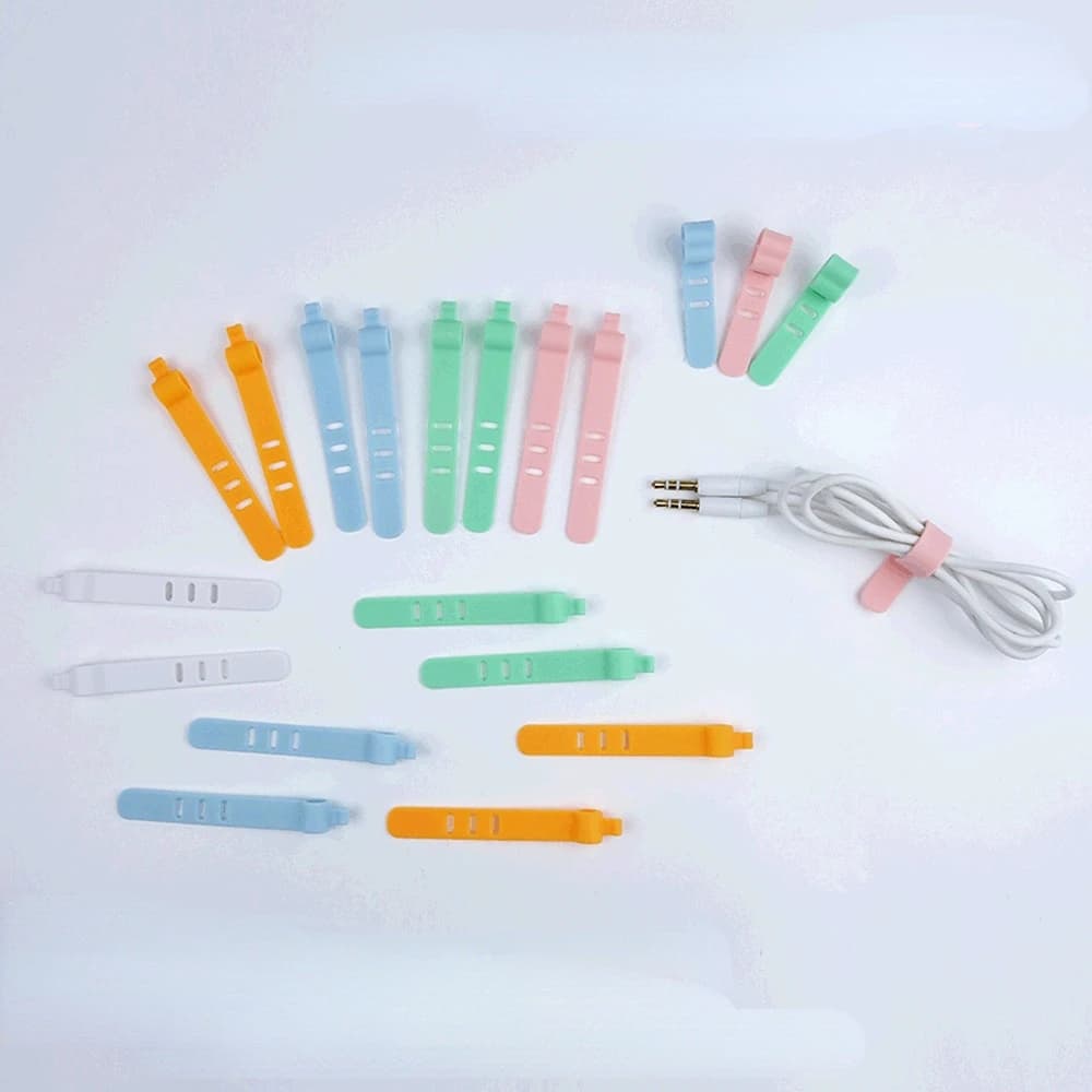 100Pcs gestione dei cavi per cuffie fissatore per cavi per cuffie organizzatore per caricabatterie avvolgicavo per telefono avvolgicavo Clip per auricolari fascetta per supporto in Silicone