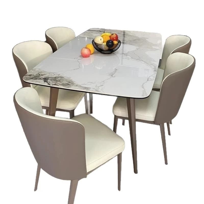 Tavolo da pranzo rettangolare semplice per piccoli appartamenti, con sedie abbinate, in stile moderno di lusso, con gambe in acciaio e piano in pietra.