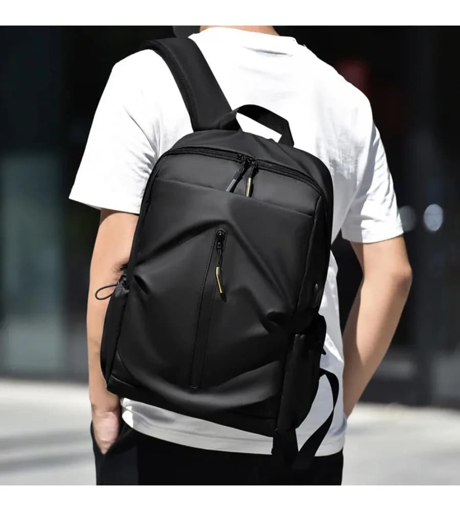 Supports external power supply this durable backpack carries notebooks clothes and accessories for long journeys