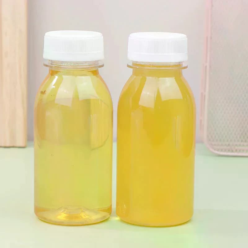 6 bottiglie d'acqua trasparenti da 200 ml per bambini, bottiglie di plastica per succhi, bottiglie per bevande e latte in PET con coperchio, bottiglie d'acqua vuote portatili
