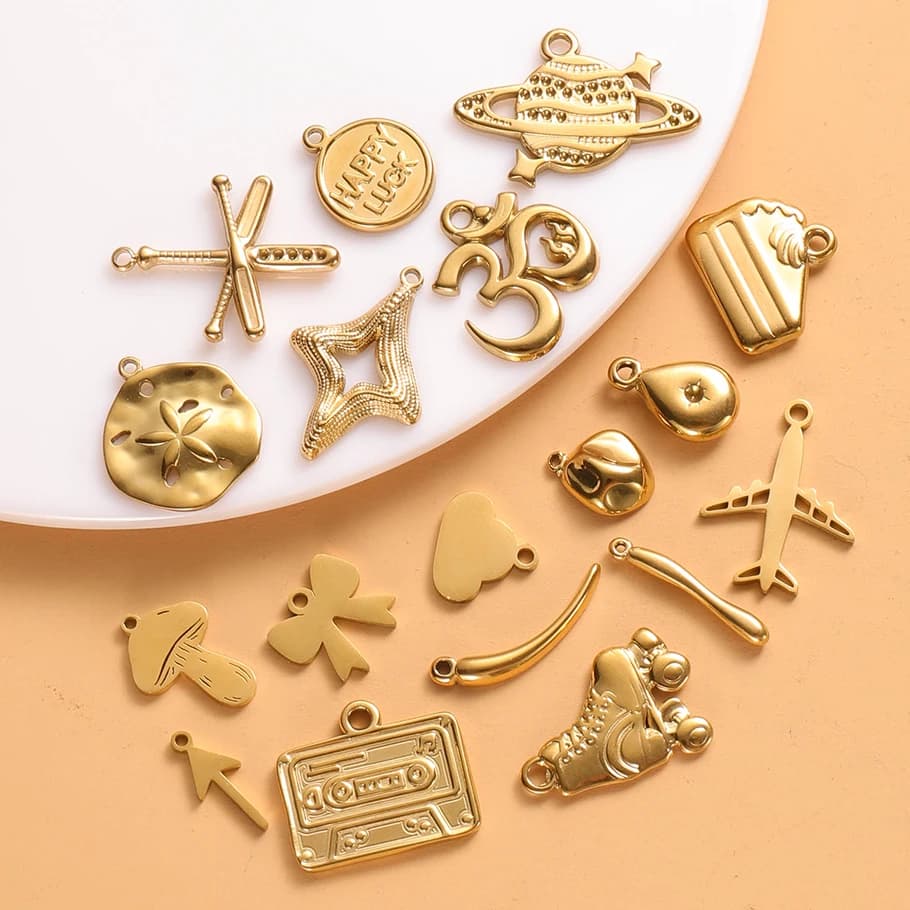 6pcs Different Styles Gold Color Stainless Steel Mushroom Cake Airplane Model Pendants DIY Arrowhead Ice-Skates Tusk Accessories