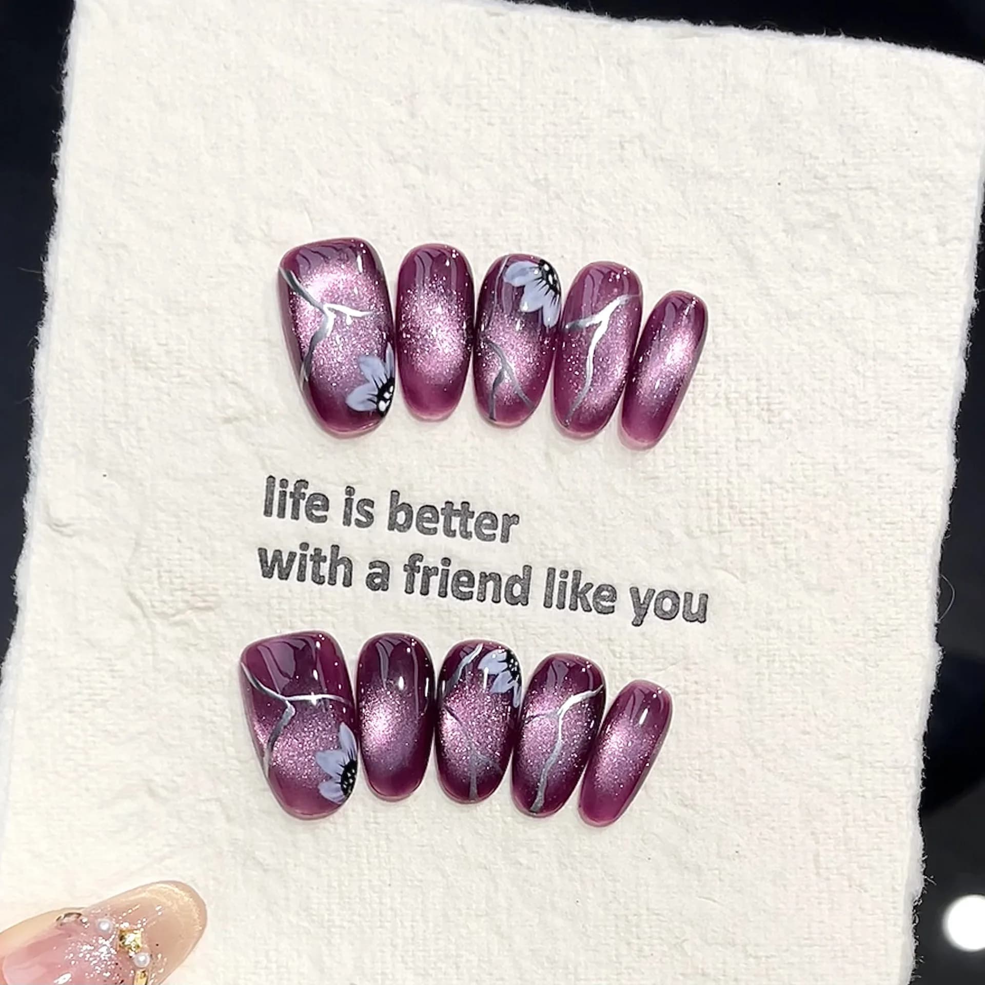 10 pieces of hand pressed nail art oval, beautiful fake nails, shiny purple shade cat eye effect with beautiful flowers, perfect for women