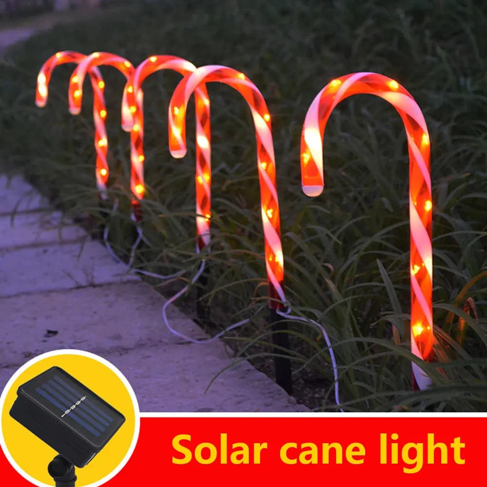 La luce solare del bastone di natale ha condotto la lampada del bastone di natale con l'illuminazione impermeabile della decorazione di natale delle luci delle fate della canna da zucchero