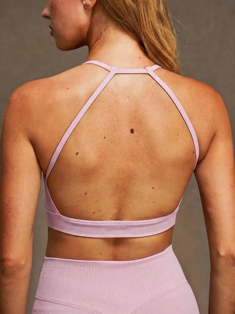 Reggiseno sportivo da donna con schiena scoperta, spalline imbottite rimovibili, top corto da yoga, morbido e confortevole, abbigliamento fitness.