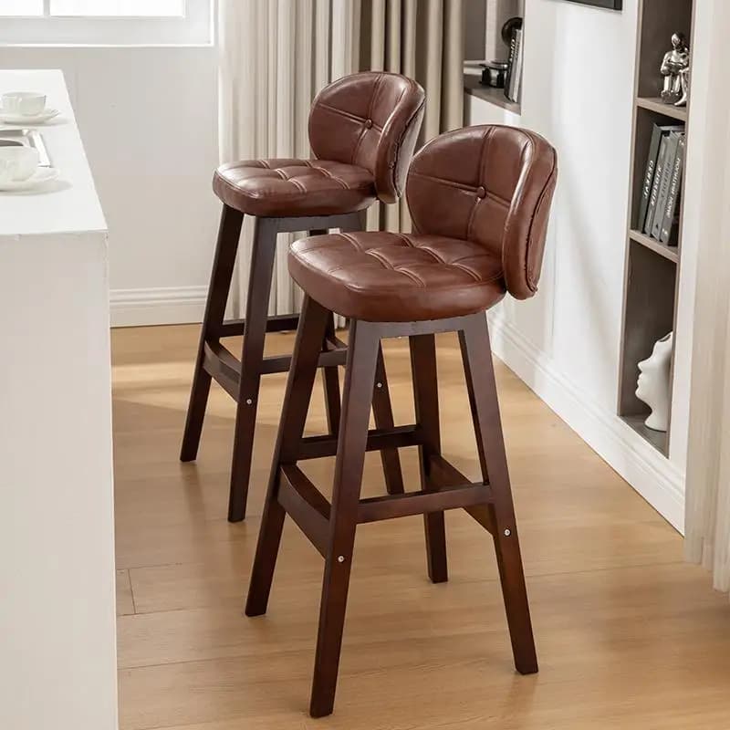 Modern and minimalist bar chairs in solid wood, waxed leather cushions, dining room stools, backrests and light luxury bar chairs.