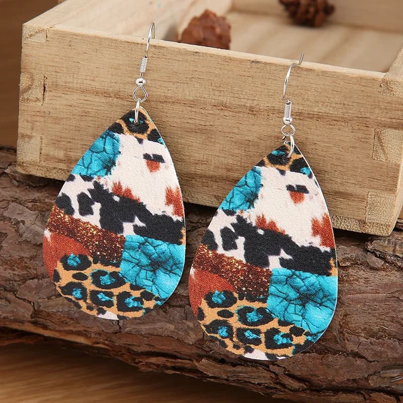 Nuovi orecchini pendenti da donna con motivo turchese in pelle con stampa leopardata vintage a forma di goccia