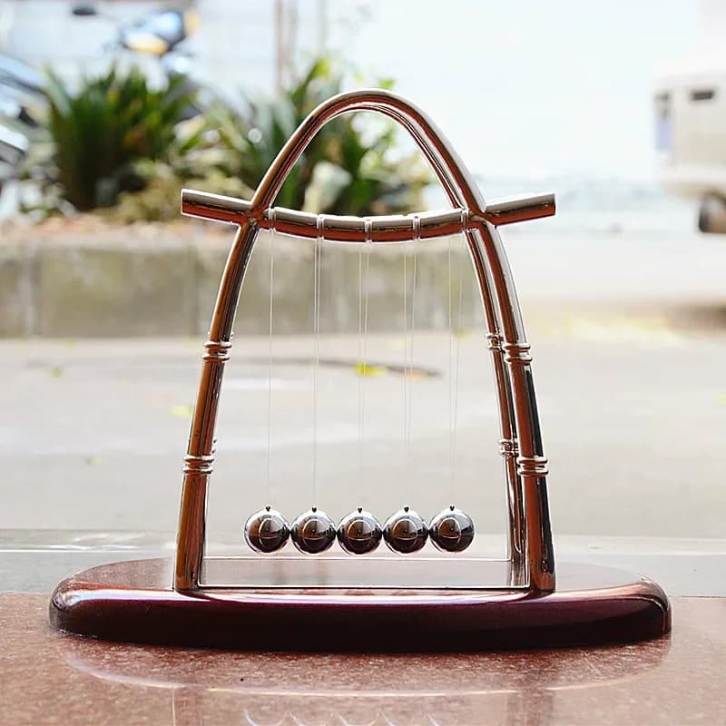 Newton Culla Balance Ball Fisica Scienza Pendolo Base ovale Supporto ad arco Sfere in acciaio Giocattolo educativo per bambini Scrivania Decorazioni per la casa Regali