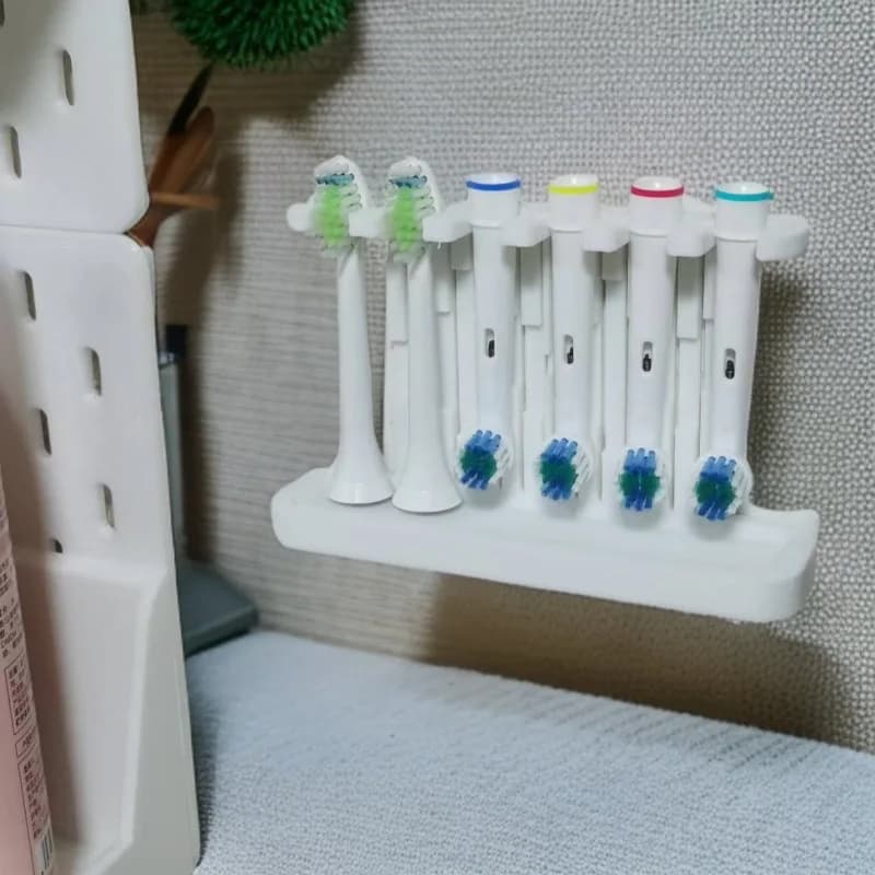 Support for electric toothbrush heads, compatible with Oral-B and Philips Sonic heads, without drilling brush holder.