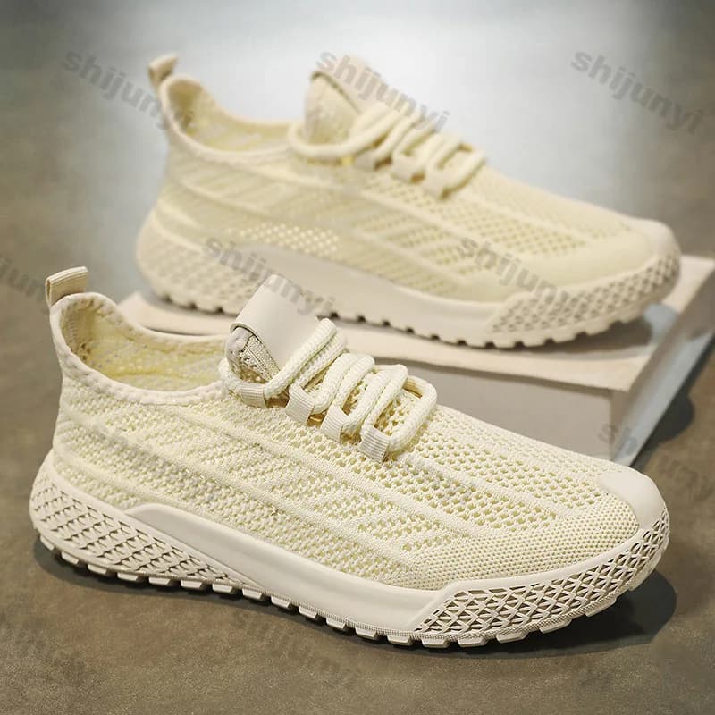 Scarpe da ginnastica bianche da uomo estive traspiranti con tessuto a mosca scarpe da corsa sportive in mesh scarpe casual leggere e comode alla moda con legatura incrociata