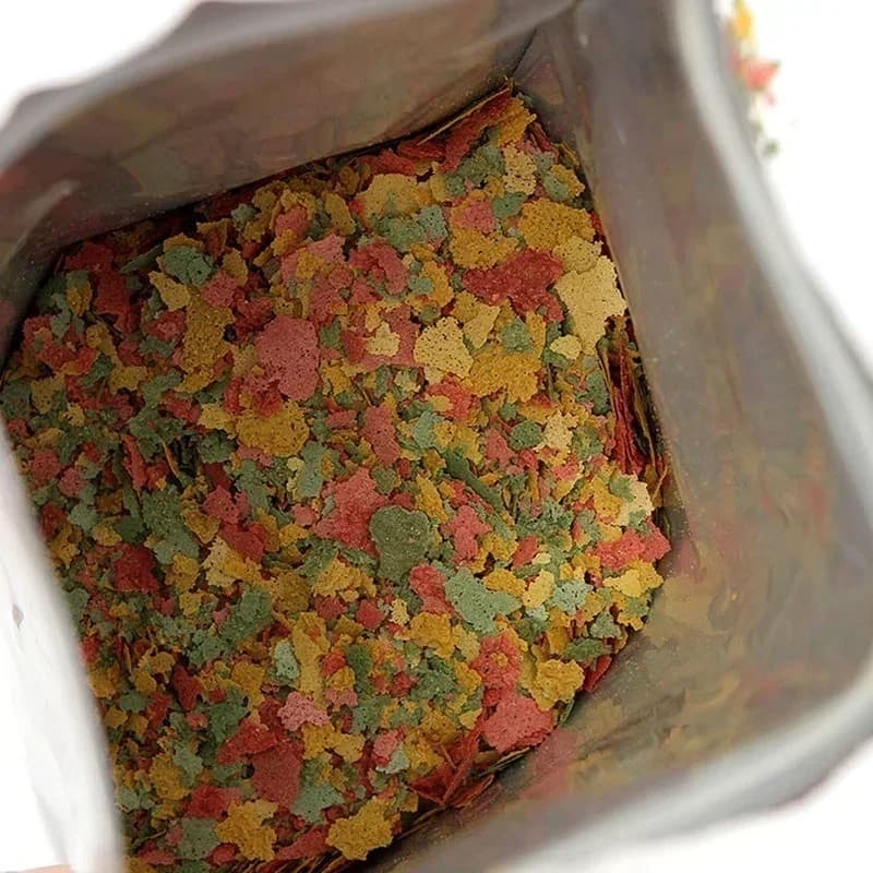 100 g/paccoPiccolo Tropicale Ornamentale Mangime Per Pesci Acquario Fetta Sottile Mangime Per Pesci Mangime Piantina Crescita Cibo Famiglia Strumenti di Pesca