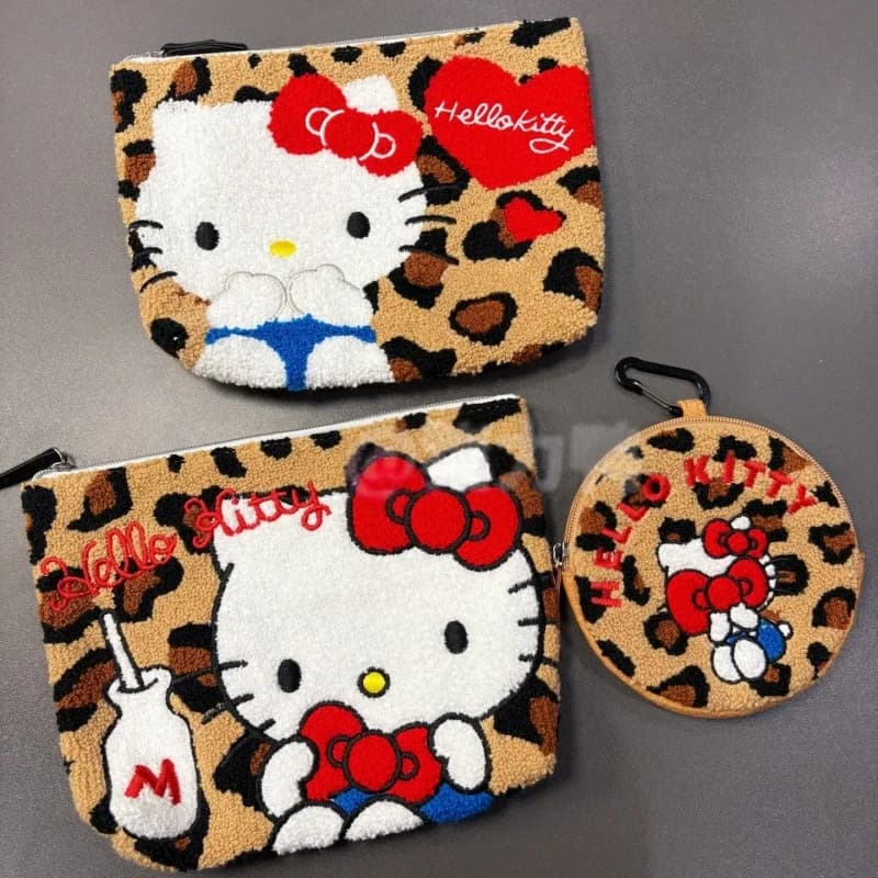 NUOVA borsa portaoggetti in peluche rotonda Hello Kitty Leopard Portafoglio portamonete Kitty Cat in pelle nera Borsa da viaggio per trucco Borsa regalo di grande capacità