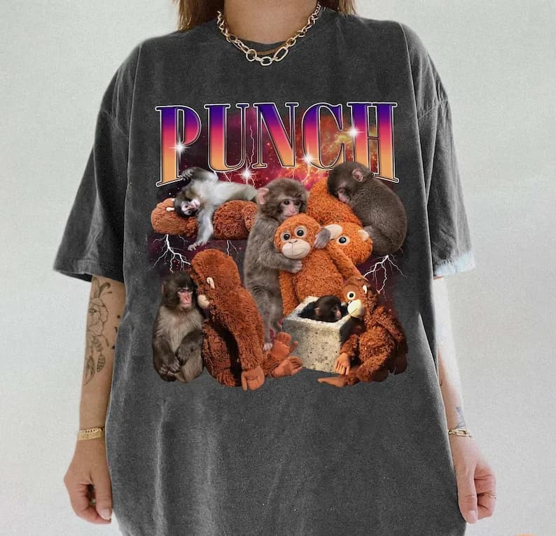 T-shirt Monkey Punch con scimmietta che tiene un peluche, felpa bootleg