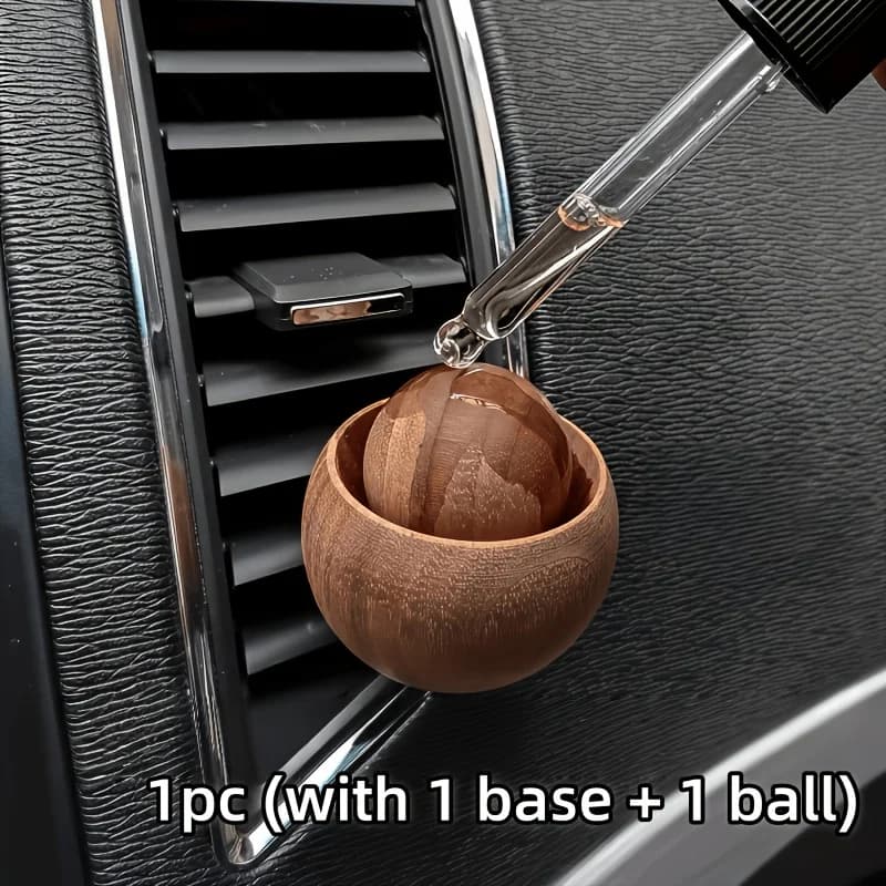 Diffusore di fragranze per auto da 1 pezzo. La base emisferica e la sfera in legno si muovono e si oscillano per aumentare la diffusione della fragranza.