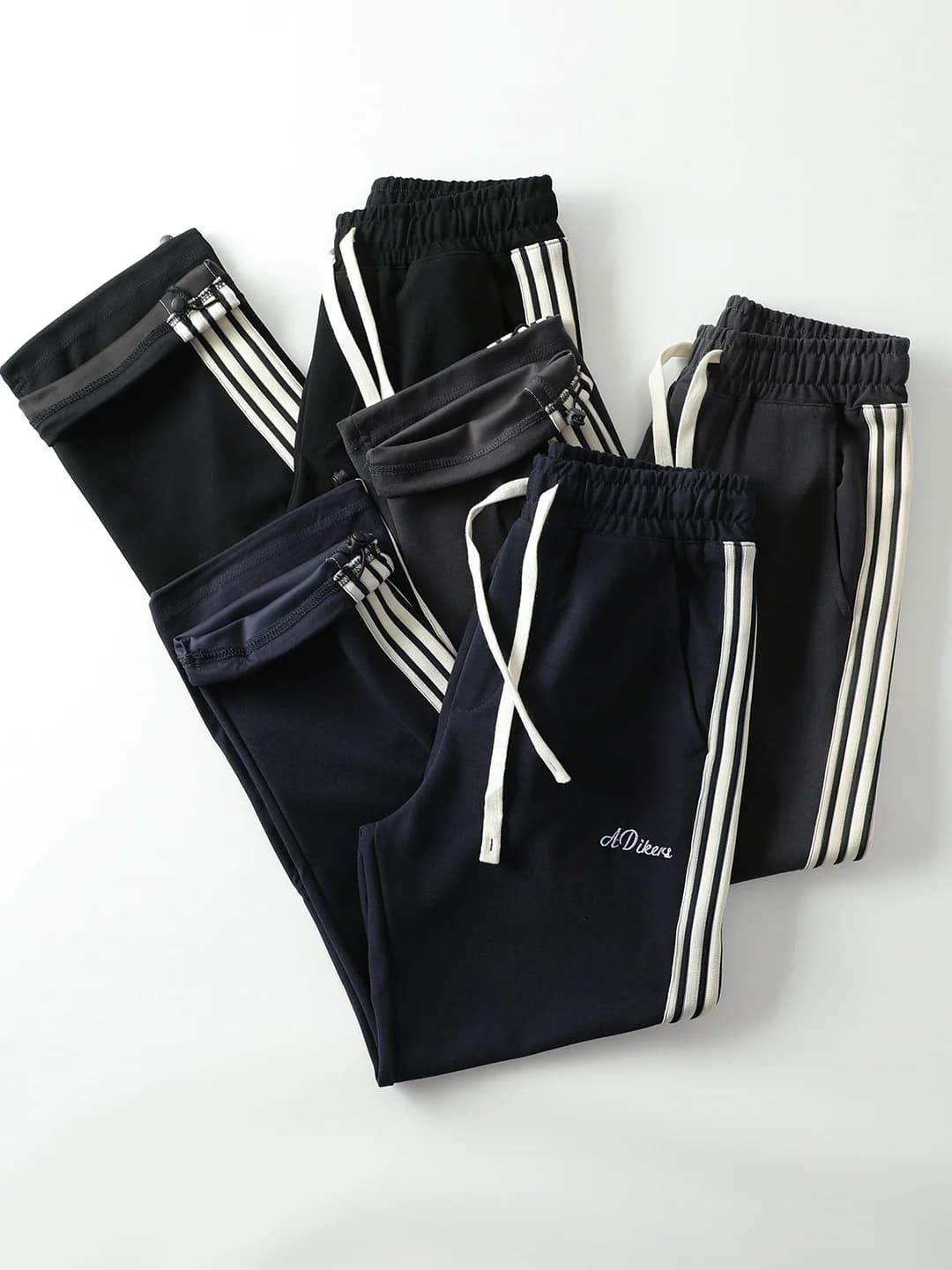 Men casual sports pants with adjustable waist, color block design and racing belt, straight leg, for autumn leisure