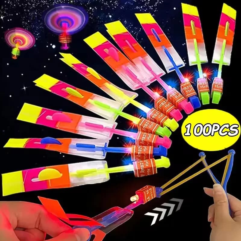 10/20/50/100pcs Incredibile Luce Giocattolo Freccia Razzo Elicottero Giocattolo Volante HA CONDOTTO LA Luce Giocattoli Partito Divertimento Regalo Elastico catapulta