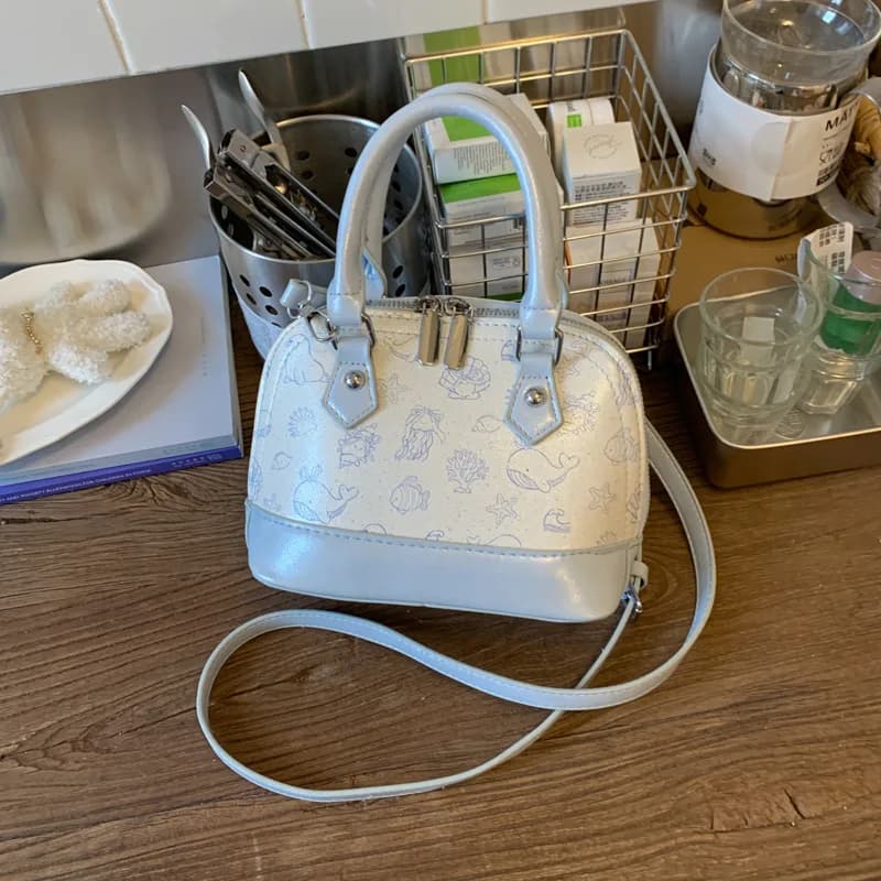 Borsa piccola portatile stampata di nicchia super popolare2025Nuova borsa a tracolla alla moda Mini borsa a conchiglia