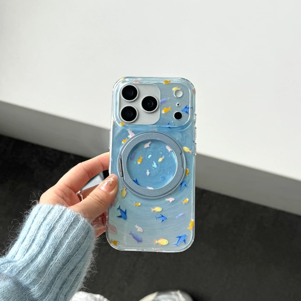 Simpatica Pesciolina Blu con Effetto Vortice 360 ° Custodia Protettiva Antiurto con Supporto Integrato Girevole per iPhone 17 16 15 14 Pro Max