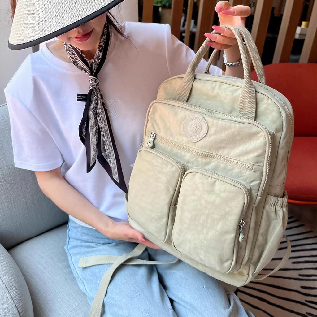 Zaino da donna multitasche alla moda con manico morbido Zaino da viaggio in nylon tinta unita Zaini scolastici casual leggeri