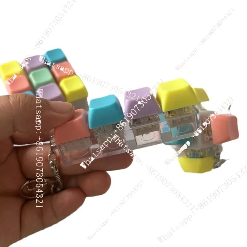 Tester di decompressione per tastiera meccanica a quattro pulsanti, portachiavi pendente antistress
