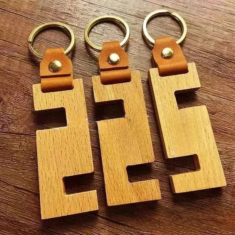 Wooden phone key chain with custom logo Keychain with laser engraving Portable DIY Keychain Custom wooden keychain Gift with pendant