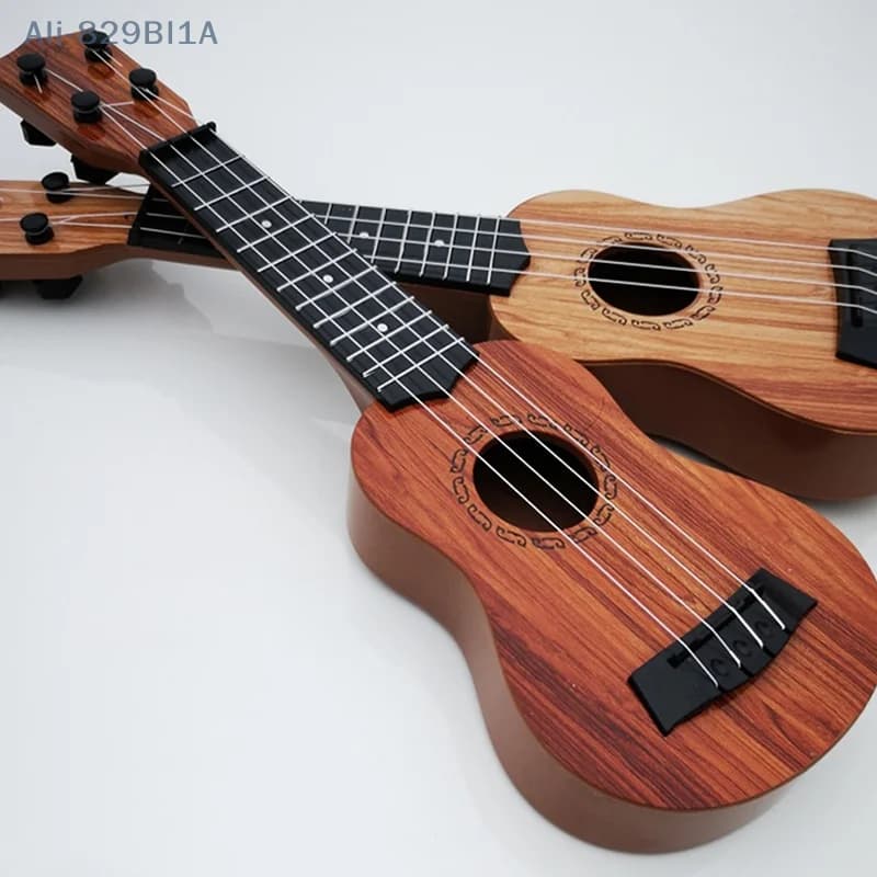 Giocattolo educativo dello strumento musicale della chitarra di Ukulele classico del principiante dei bambini