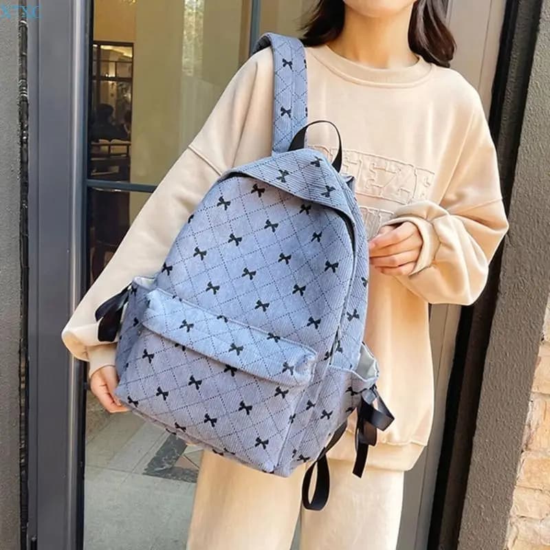 Zaino X7XC per ragazze adolescenti Borsa da viaggio in velluto a coste con stampa fiocchi Zaino