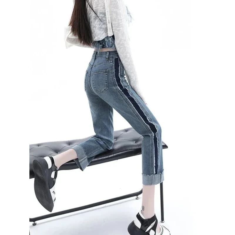 Jeans a vita alta a gamba dritta da donna con un design elegante per l'estate 2024. Nuovi jeans cropped a blocchi di colore con risvolto, stile ciga, per il commercio transfrontaliero.