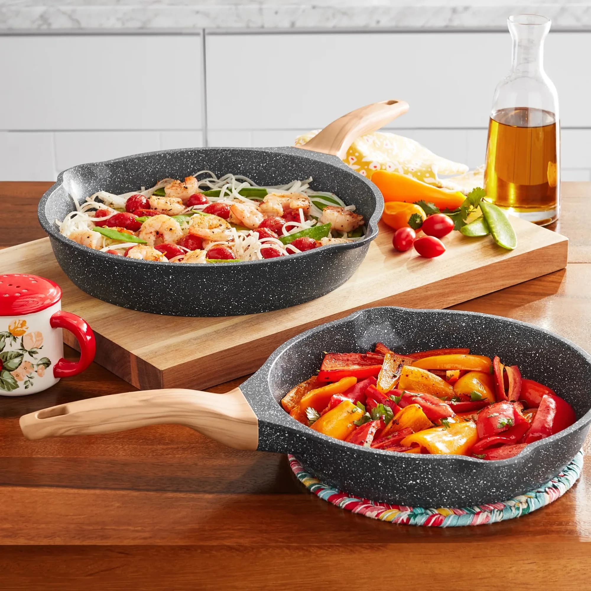 Set of 10" and 12" die-cast aluminium pans, coal balls, light design