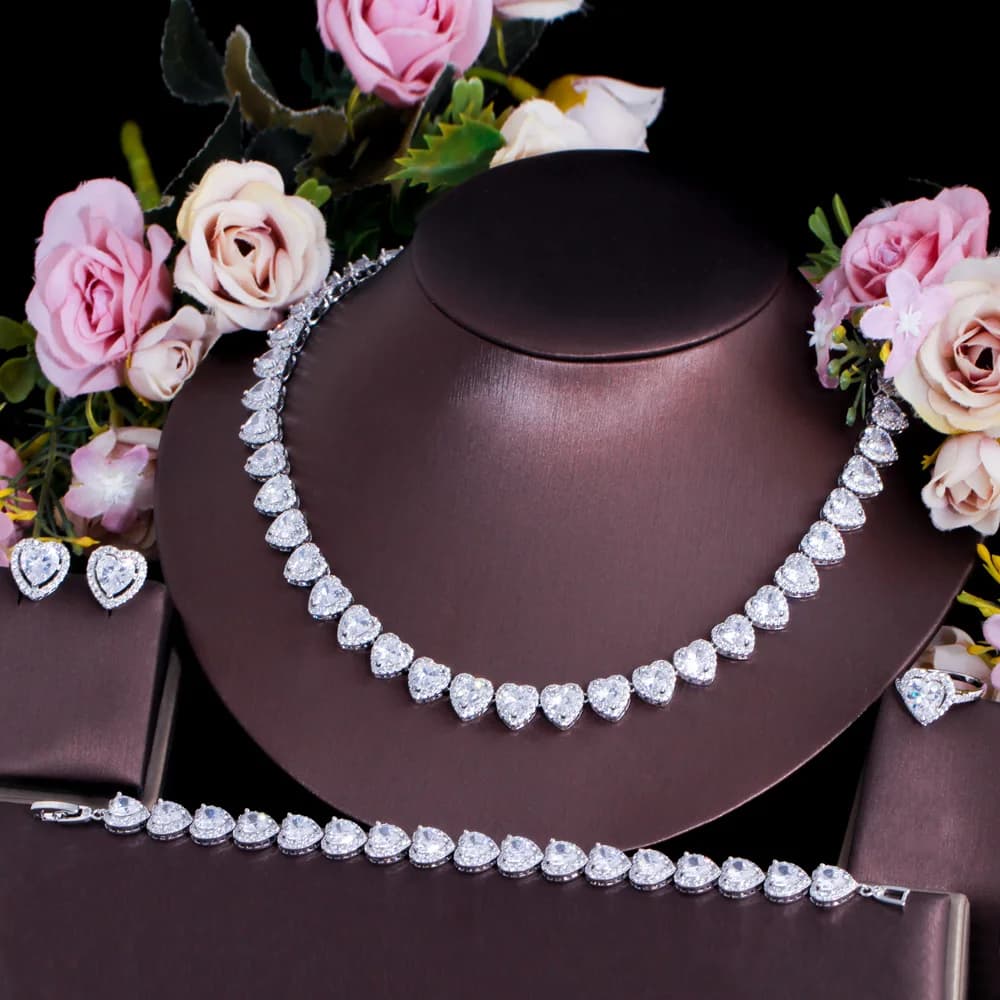 ThreeGraces 4 pezzi cuore lucido zirconi cubici cuore di lusso orecchini collana braccialetto set di gioielli da sposa per le donne TZ951
