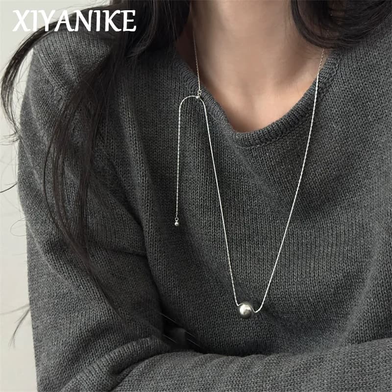 XIYANIKE Long necklaces with minimalist ball pendant for women Fashion New adjustable sweater Jewelry chain Gift Birthday party