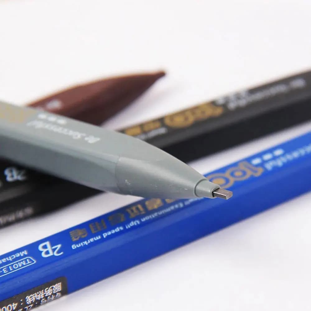 2B mechanical pencil set, including 1 pencil and 6 lead pieces, black lead, no-sharpening lead (color random).