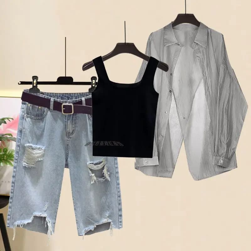 2025 New woman's summer shirt in grey chiffon with sun protection + knitted vest + jeans shorts with hole Set of 3 pieces Korean elegant pants 2 pieces