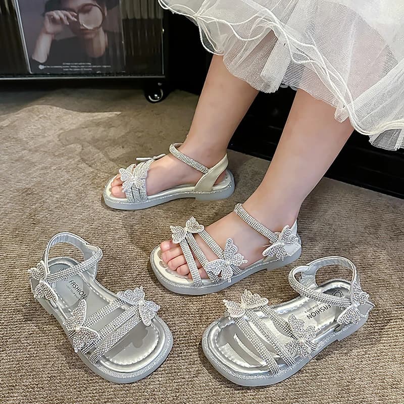 Sandali con cinturino per bambini per ragazze 2025 Nuove scarpe da spiaggia estive per bambini con paillettes scintillanti Suola morbida Scarpe da principessa per ragazze