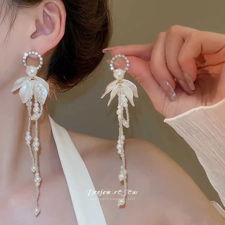 Beaded light luxury petal long fringed earrings Mori shell earrings earrings Silver needle vacation style exaggerated earrings