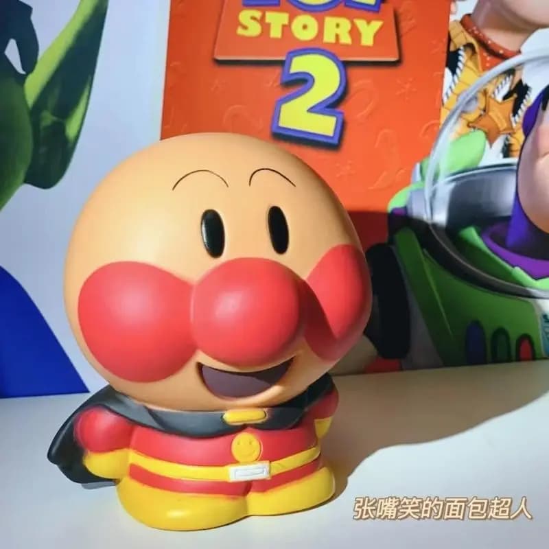 Anpanman piggy bank, cute student toy, cartoon decoration, fun holiday gift, money-saving jar