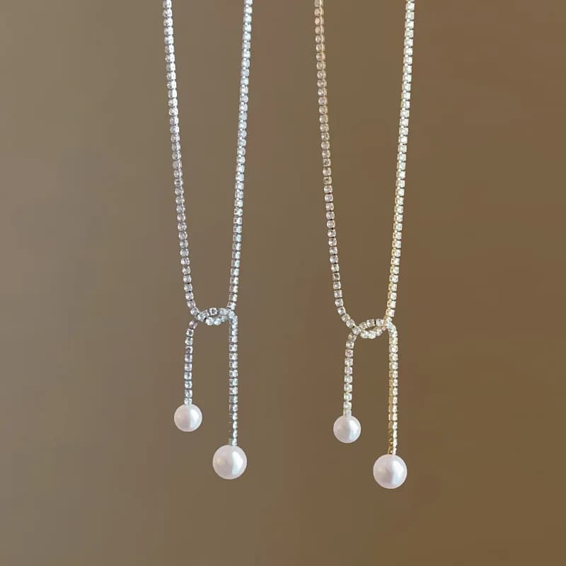 Collane con pendente a nappa annodata con perle simulate in zircone CZ francese Minar per donna, girocollo con catena in rame placcato oro e argento.