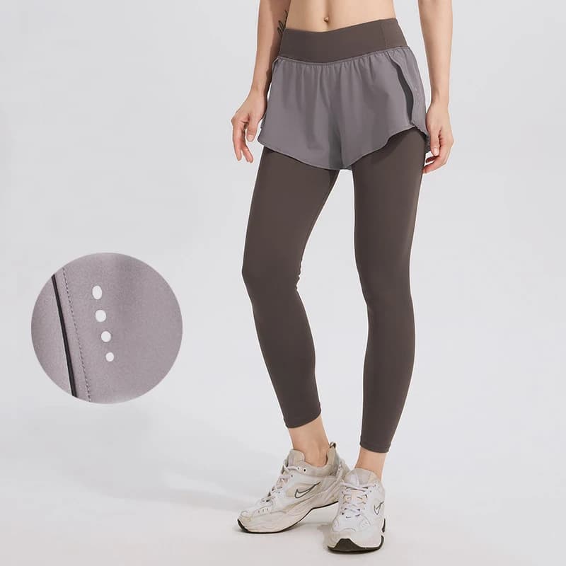 Pantaloni da yoga finti a due pezzi da donna con tasche laterali, leggings lunghi elasticizzati e aderenti per corsa, allenamento e fitness
