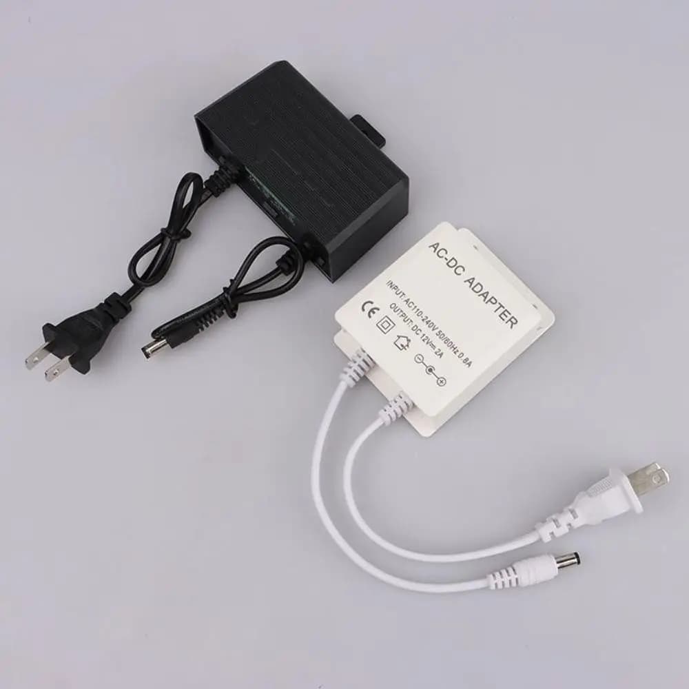 Alimentatore per Telecamera CCTV in Plastica, Spina USA, Adattatore di Alimentazione Impermeabile AC/DC 12V 2A per Telecamere di Sicurezza Domestica