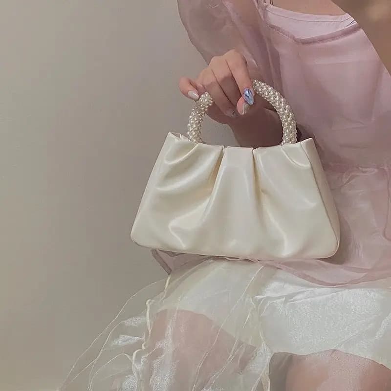 2025 Versione coreana della nuova perla piccola borsa da donna borsa a pieghe nuvole borsa per cellulare borsa a tracolla mini piccola borsa