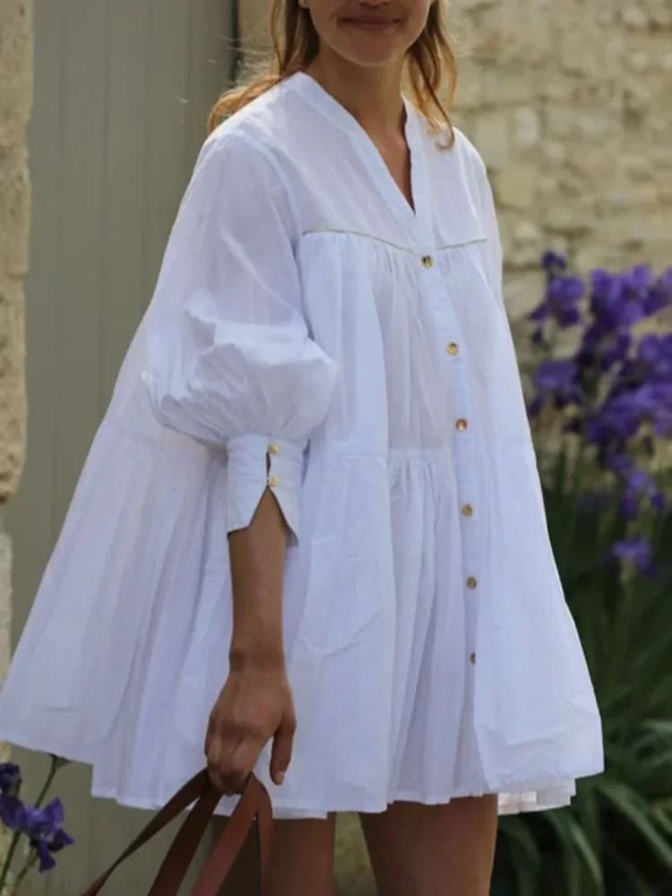 Abito da donna a camicia a pieghe con bottoni e maniche a sbuffo in cotone bianco, mini abiti casual larghi per le vacanze estive in giardino