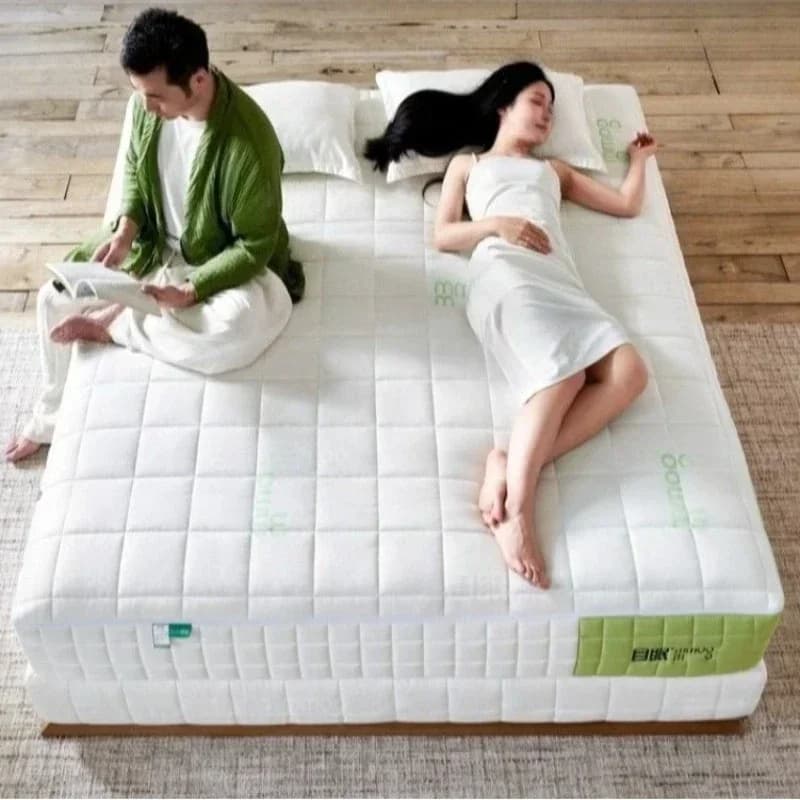 Double mattress in natural latex with single pocket springs and jute coating, available in sizes 120x200, 150x200, 180x200, 200x220 cm, with mattresses for sleeping.