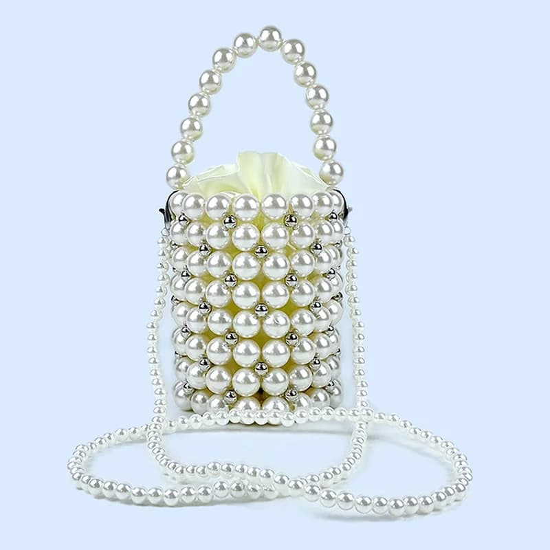 Borsa di perle intrecciate a mano cava, borsa a secchiello rotonda, borsa da fata tenuta in mano, abbinata a una piccola borsa con gonna