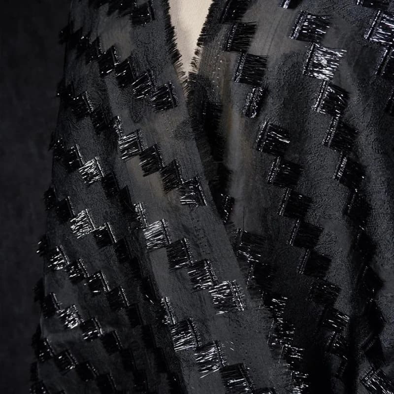 Giacca da abito in tessuto jacquard taglio fatto a mano nero lucido con nappa quadrata micro trasparente Tessuto di design creativo di moda