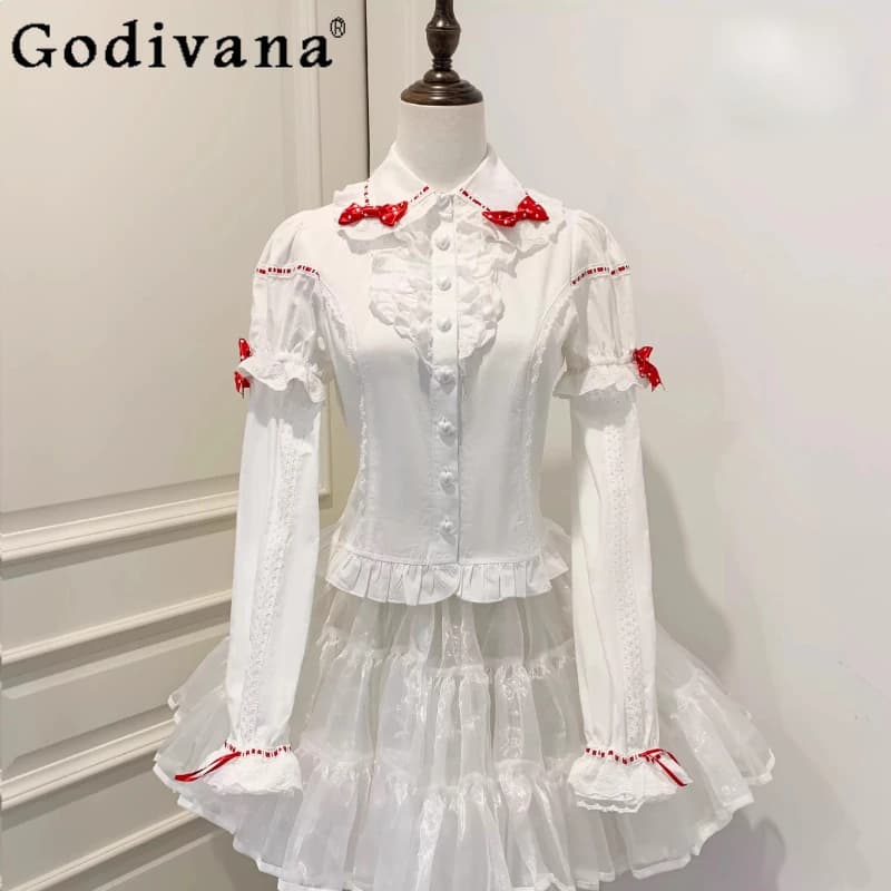 Camicia originale giapponese dolce Lolita autunno ragazze carino fiocco maniche di giunzione colletto per bambola camicette a maniche corte Kawaii top Mujer