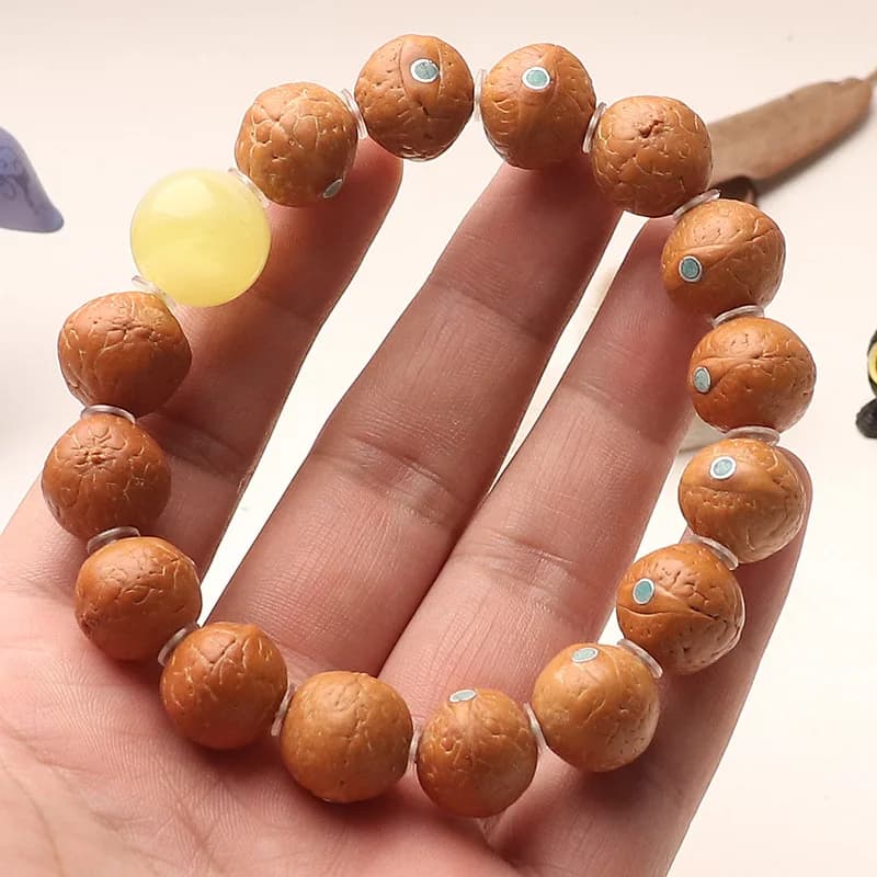Autentico Braccialetto Bodhi Occhio di Fenice del Nepal con Incastonatura in Turchese e Magnesite - Regalo Buddista Unisex con Perline